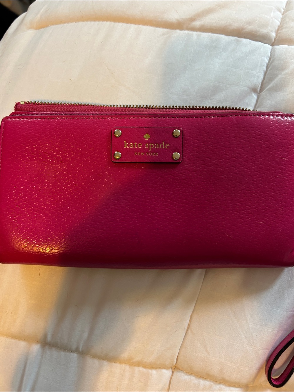 kate spade Bright Fuchsia Leather Zip Wristlet with no marks, holds a cell phone